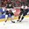 Le joueur du Canada Nicolas Roy avance avec la rondelle alors que le Slovaque Erik Cernak le pourchasse. Photo : Matt Zambonin / HHOF-IIHF Images